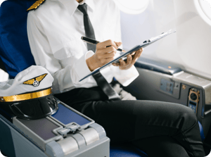 asian-confident-feale-pilot-in-uniform-leaning-at-2024-11-01-18-35-07-utc